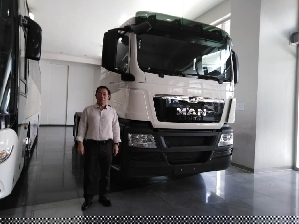 MACC Managing Director Fernando Lu at the showroon with the latest MAN truck model